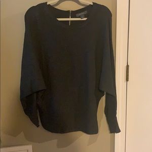 Grey sweater with zip up the back